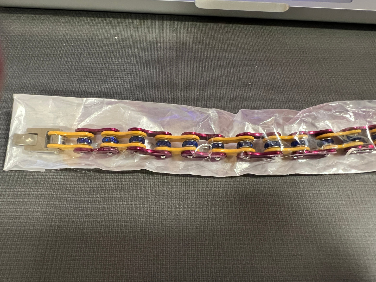 Red and Yellow Motorcycle chain with blue bling bracelet