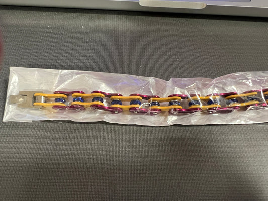 Red and Yellow Motorcycle chain with blue bling bracelet